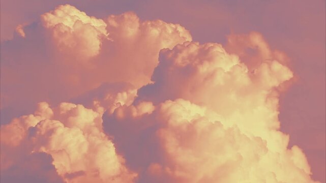 Time Lapse footage of dramatic surreal pinkish sky with fluffy clouds flowing