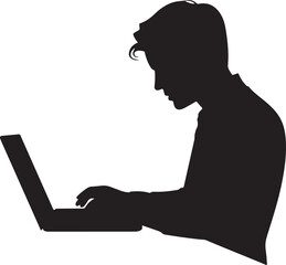 Silhouette of a young man working on a laptop computer