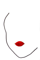 A symbolic image of a woman's face with a red autumn leaf on a white background