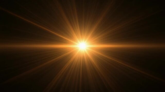 Bright golden sunburst effect with radiating light beams against a dark background, creating a warm and intense illumination.