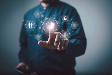 A business professional interacts with a digital security interface, highlighting data protection, cybersecurity, and secure access technology for modern networks and advanced IT systems.