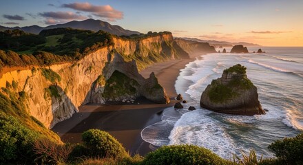 Dramatic cliffs meet the ocean at sunset creating a stunning coastal vista perfect for travel inspiration
