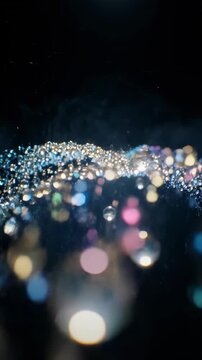 Cinematic phantom waves of shallow depth of field bokeh spheres subtly shifting and dissolving in a flowing, dark atmospheric environment moody, design, dark