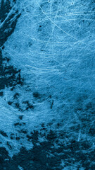 blue old aluminum sheet with burnt marks from the pan