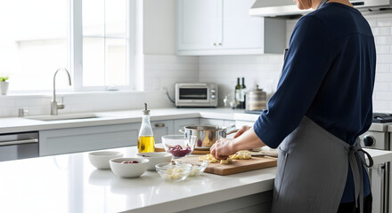 Culinary Creations in the Kitchen: An individual attentively prepares a gourmet meal in a contemporary kitchen setting, showcasing fresh ingredients. 