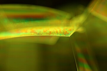 Green liquid surface, phenomenal structure, green oils on a geometric background, colourful luminous abstract, surrealistic art, glowing effects