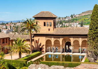 Ladies tower of Alhambra palace and gardens of Partal, Granada, Spain