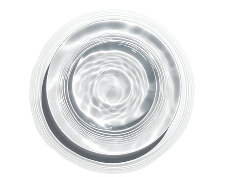 Circular water surface with concentric rings and delicate ripples, isolated on a black background