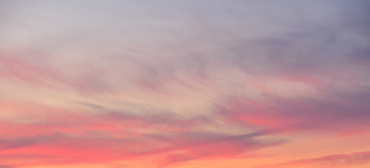 Ethereal Sunset Sky with Pastel Clouds horizontal