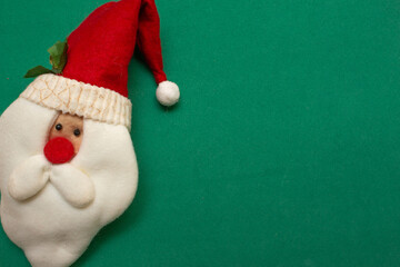 Santa Claus face on a green background - Christmas time