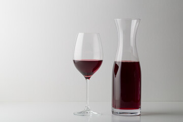 Red wine glass on white background
