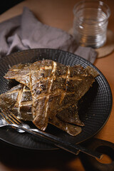 Baked flounder fish on a plate