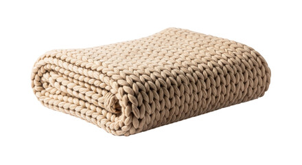 Folded beige knitted blanket, a cozy and warm textile for snuggling up on the couch or bed on a cold winter day