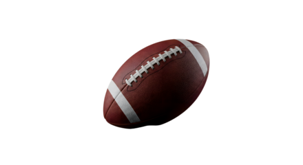 American football in motion against a dark background