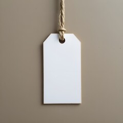 A blank white tag hangs on a string.