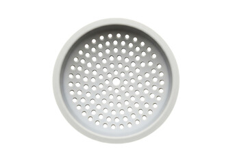 White round perforated filter disc with a detailed hole pattern isolated on transparent background