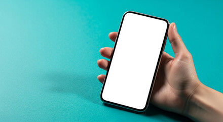Hand holds a smartphone with blank white screen, implying digital communication or technology showcase against a cyan textured surface, modern concept