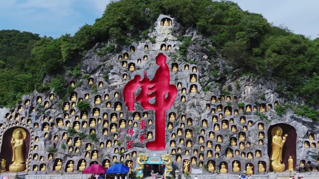 Shaoguan Donghua Temple Aerial View with Buddha Niches and Red Sculpture