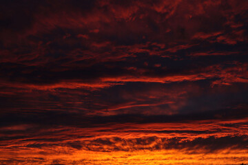 A bright brown-orange autumn sunset