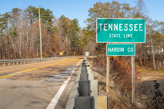 Tennessee road sign at state line in late fall scenery