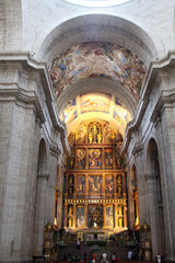 Naklejka premium Interior view of the Basílica de San Lorenzo de El Escorial, showing the main altar, July 2024.