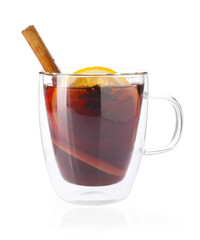 Tasty mulled wine with spices and orange slices in glass cup isolated on white