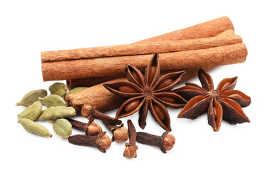 Mulled wine spices. Cinnamon sticks, anise stars, cardamon seeds and cloves isolated on white