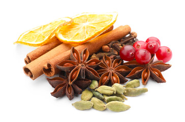 Different spices, cranberries and dry orange slices for mulled wine isolated on white
