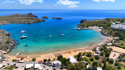 Fototapeta premium Aerial drone photo of paradise organized main beach of Lindos with amazing turquoise waters, Rhodes island, Dodecanese, Greece