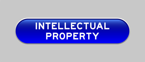 Fototapeta premium Blue color capsule shape button with word intellectual property on gray background