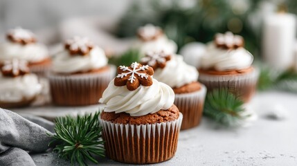 Chocolate cupcakes topped with rich frosting and snowflake decorations create a warm festive mood for the holiday season