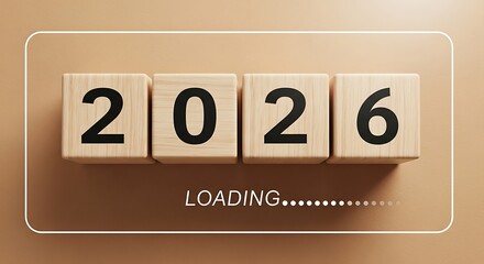 Wooden blocks displaying the year 2026 with a loading indicator below