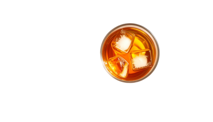 Amber liquid in glass, with three ice cubes. Top-down view