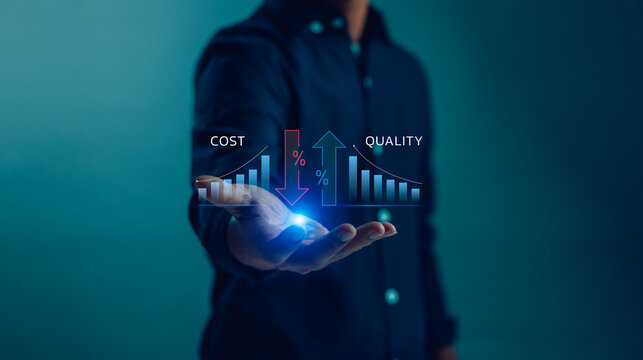 Businessman hand holding hologram graph showing cost down and quality improvement concept. Business strategy for reducing expense and increasing customer satisfaction and product value