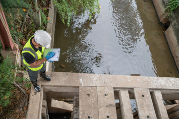 Environmental scientists are examining drainage channels around the city.