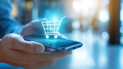 Shopping online with a smartphone while using a digital cart icon for convenience in a bright environment