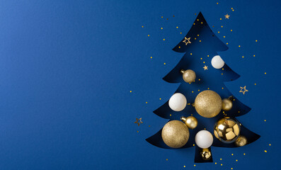A dark blue backdrop hosts a stylized Christmas tree adorned with gold glitter balls and white...