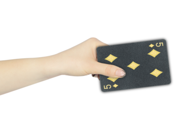 playing card diamonds 5 in hand, outstretched hand with black playing card isolated from background