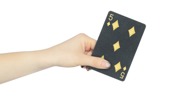 playing card diamonds 5 in hand, outstretched hand with black playing card isolated from background