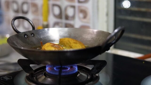 Mirchi vada or mirchi pakoda deep fried chili filled with spicy potato