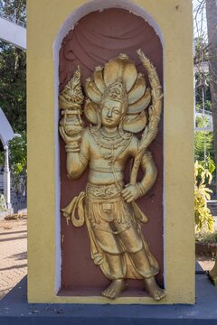 A figure of naga king (cobra king) in Sri Bodhirajaramaya Buddhist temple in Thelulla, Sri Lanka