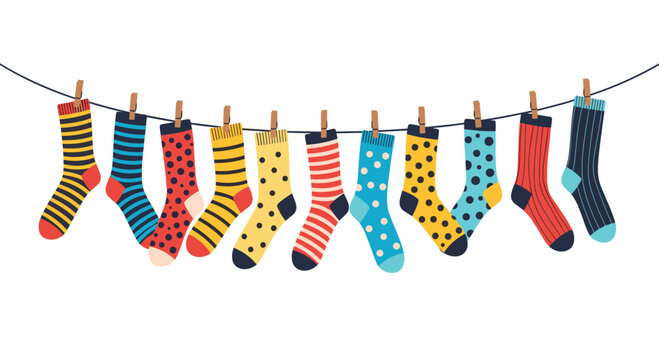 A cheerful collection of colorful and patterned socks hanging on a clothesline with clothespins to dry on white.