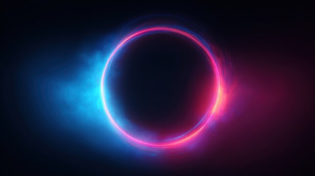 Abstract glowing circle with blue and magenta light trails on dark background