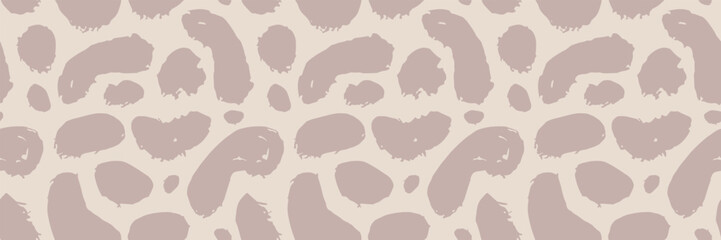 Cute seamless background with neutral leopard dot pattern texture.