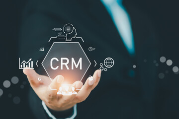 Businessman presenting digital CRM interface with AI driven customer tools, data analytics icons, and global connection elements representing smart customer management and modern business technology.