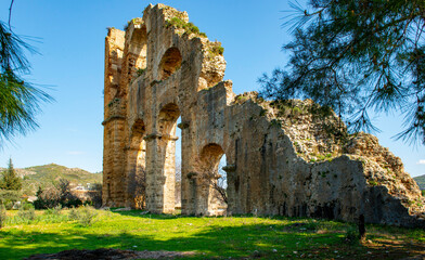 The Theatre and Aqueducts of the Ancient City of Aspendos is located in Southern Turkey, in the ancient Pamphylia region by the Eurymedon (K&ouml;pr&uuml;&ccedil;ay) river. The acropolis lies about 60 m. above sea 