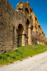 Fototapeta premium The Theatre and Aqueducts of the Ancient City of Aspendos is located in Southern Turkey, in the ancient Pamphylia region by the Eurymedon (Köprüçay) river. The acropolis lies about 60 m. above sea 