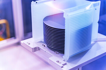 patterned silicon wafers in a universal pod. Electronic circuit designs have been built onto the wafers using micromaching including photolithography