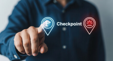 Hand of a person interacting with digital interface, selecting a checkpoint icon, showcasing modern technology and user engagement in a virtual environment with vibrant graphics