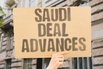 "Saudi Deal Advances" Bilateral agreements foster economic partnerships in the region. SAUDI. DEAL. AGREEMENTS. PARTNERSHIPS. ECONOMIC.